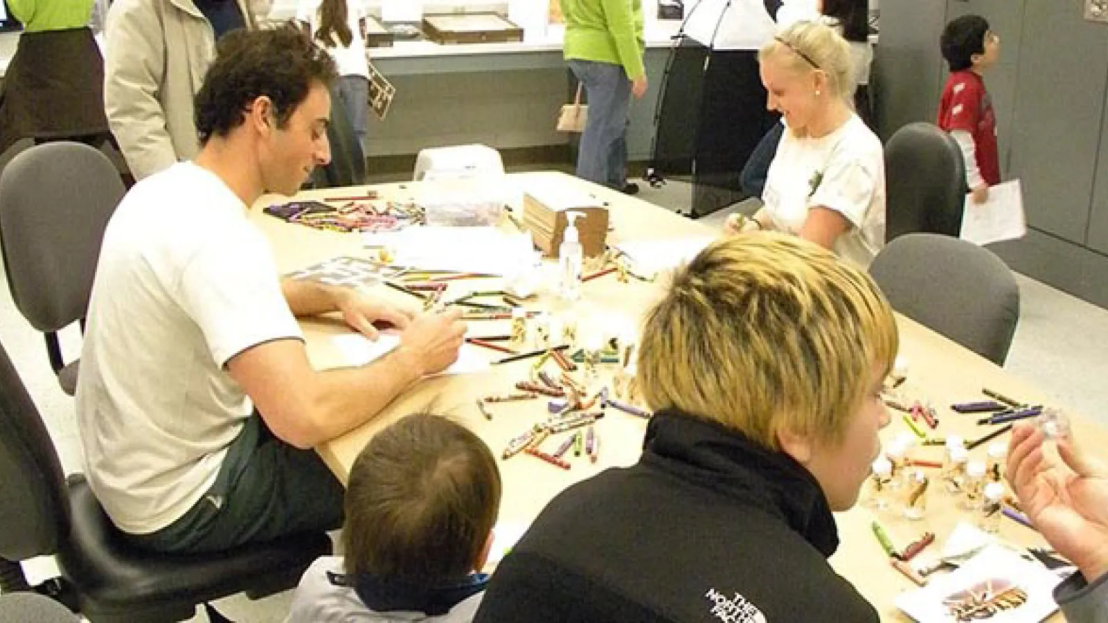 Elijah Talamas and Emily McDermott at the Bug Drawing Table