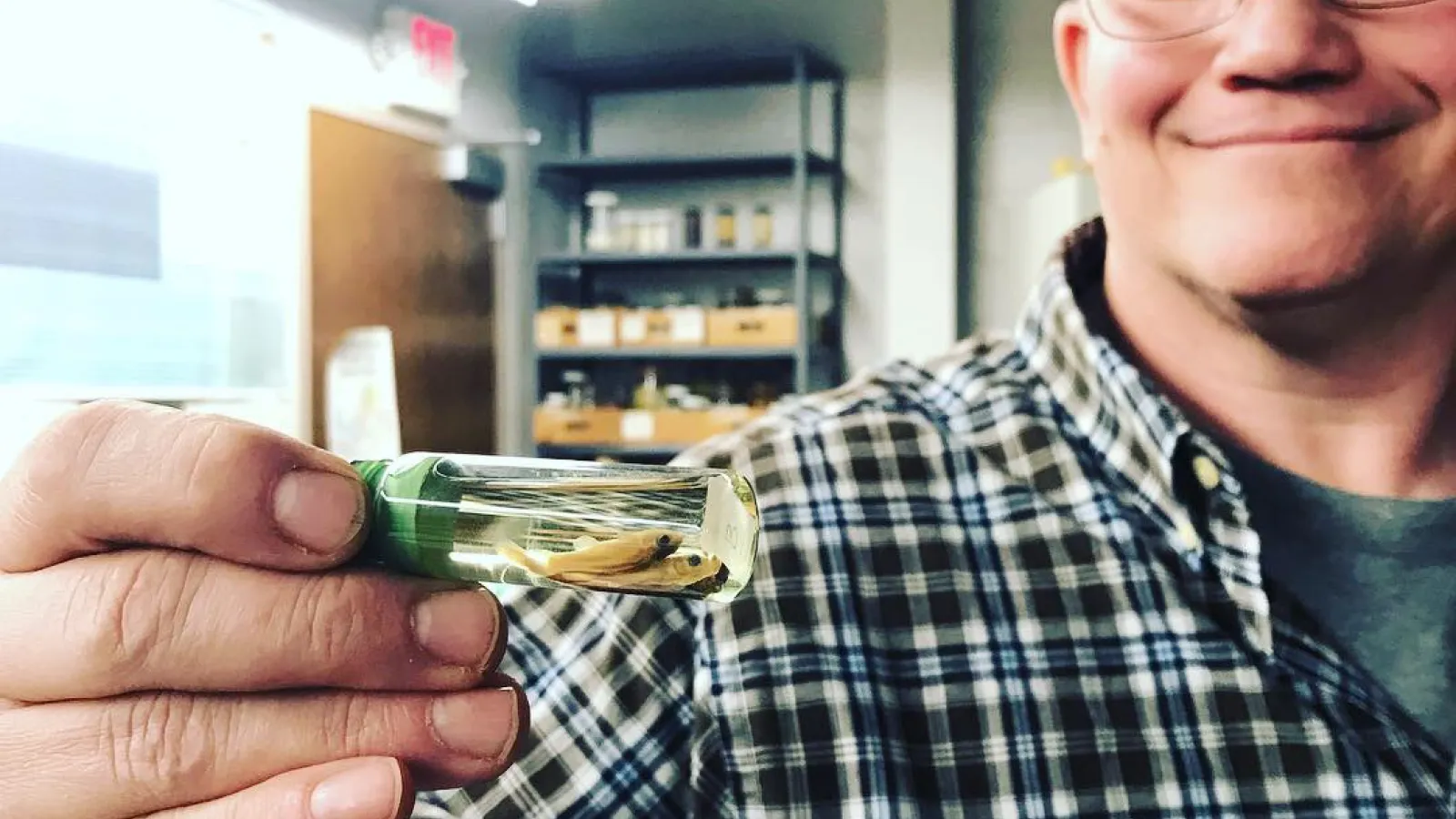 Marc Kibbey holding a Fish