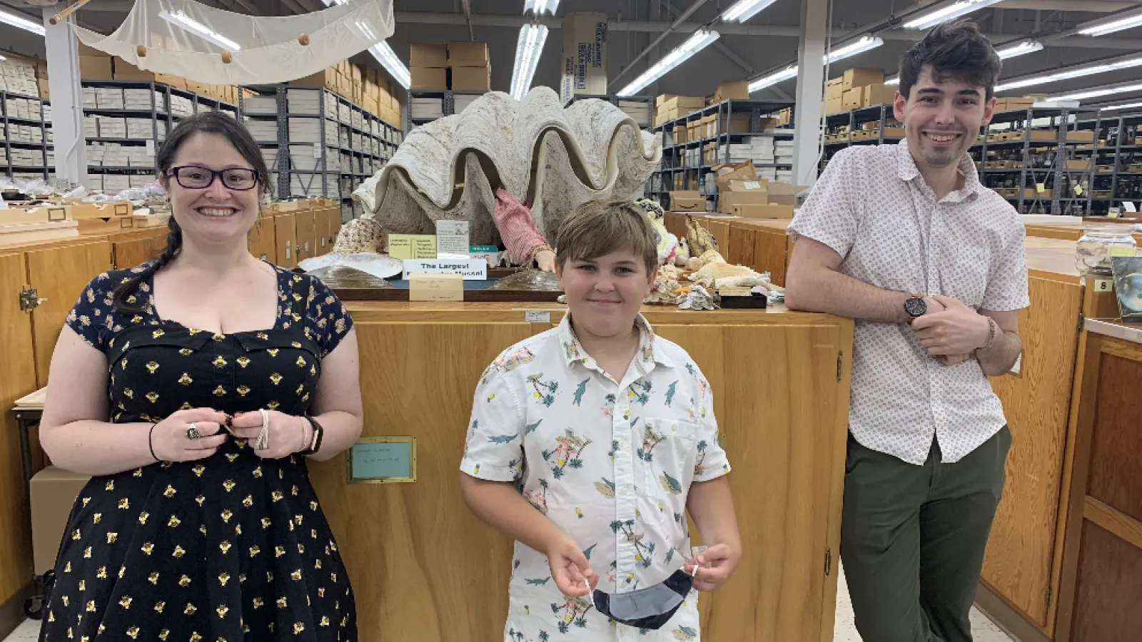 Sara Klips (OSU Alumna/Volunteer), Evan Schmidt (budding malacologist) and Nate Shoobs (Curator) standing in MBD Bivalve Mollusk Range