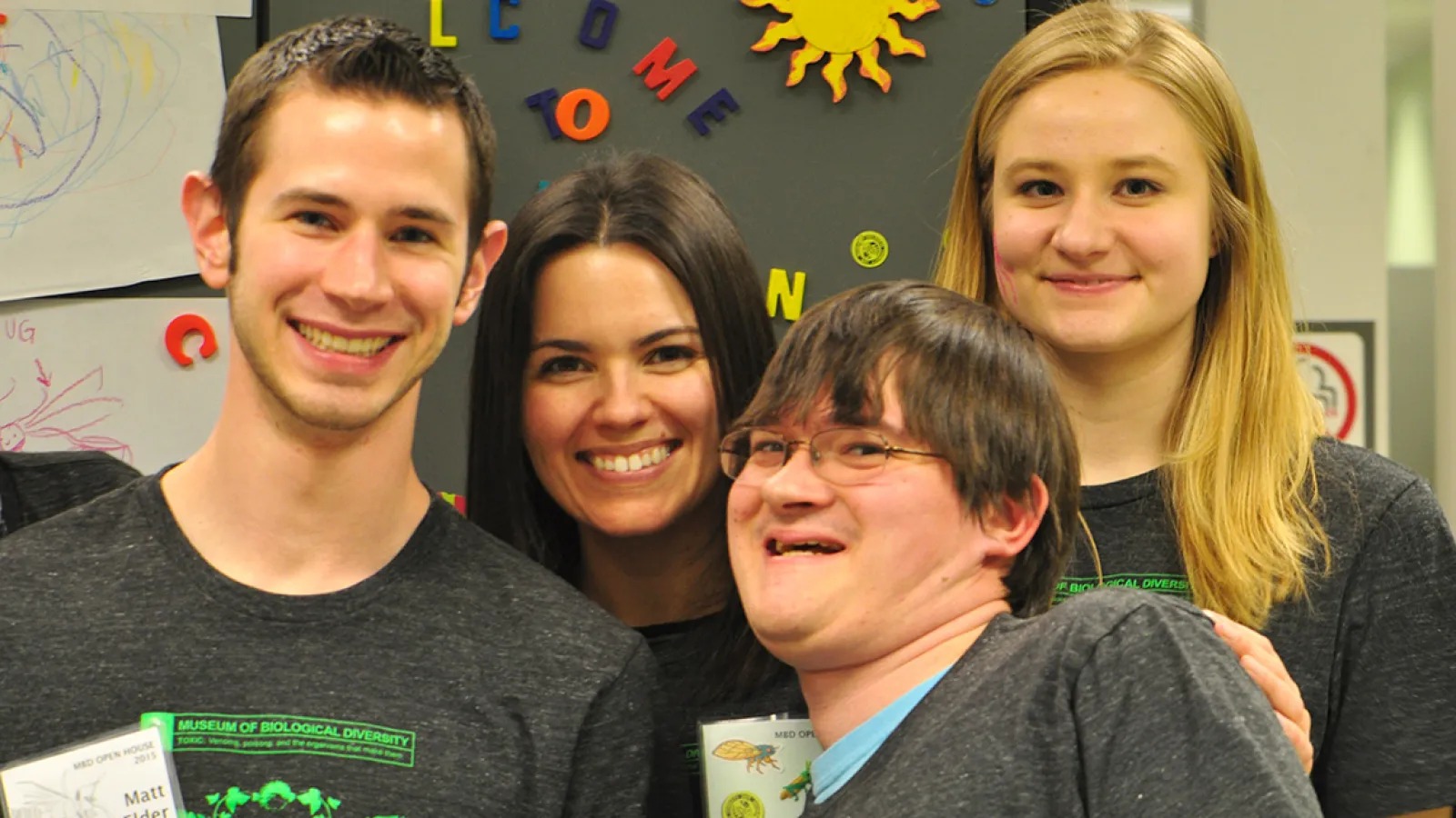 Four smiling volunteers during Museum Open House 2015