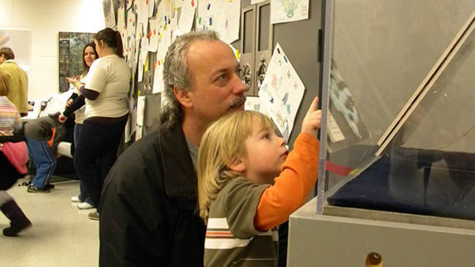 Entomologist Steve Chordas and his son at the Triplehorn Insect Collection