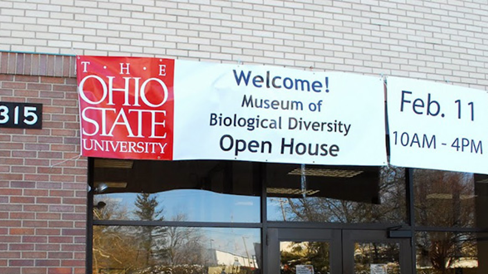 Welcome banner at the front door of the Museum in 2012